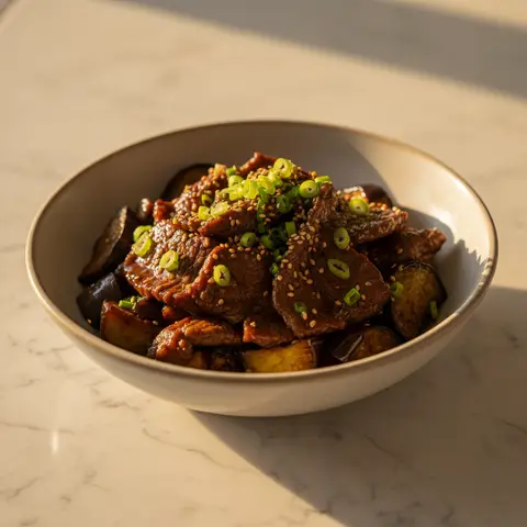 Poelee de boeuf teriyaki aux aubergines et oignons verts